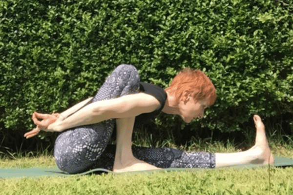 Women doing Yoga in the garden